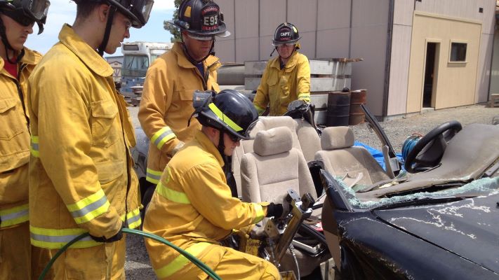 several trainees performing auto extraction training